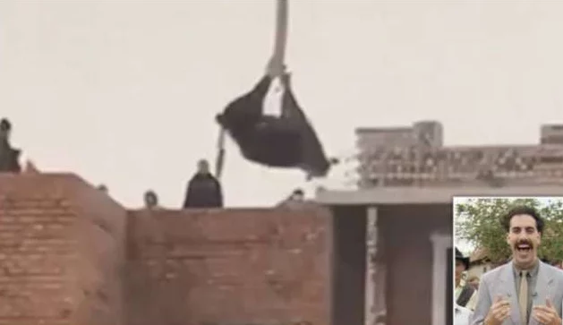 Изображение 1 для Нас опять сравнили с Боратом. На сей раз из-за поднятой на кране коровы