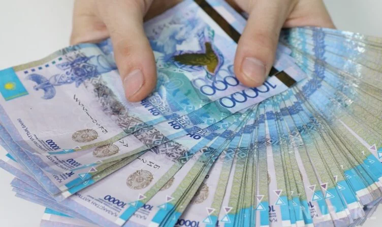 Тенге падает в парах с долларом и рублем - изображение 1