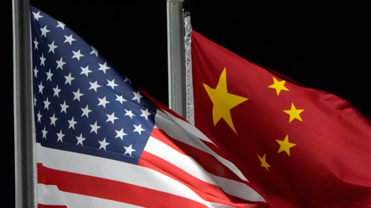 США обвинили двух граждан КНР в препятствовании делу Huawei - изображение 1